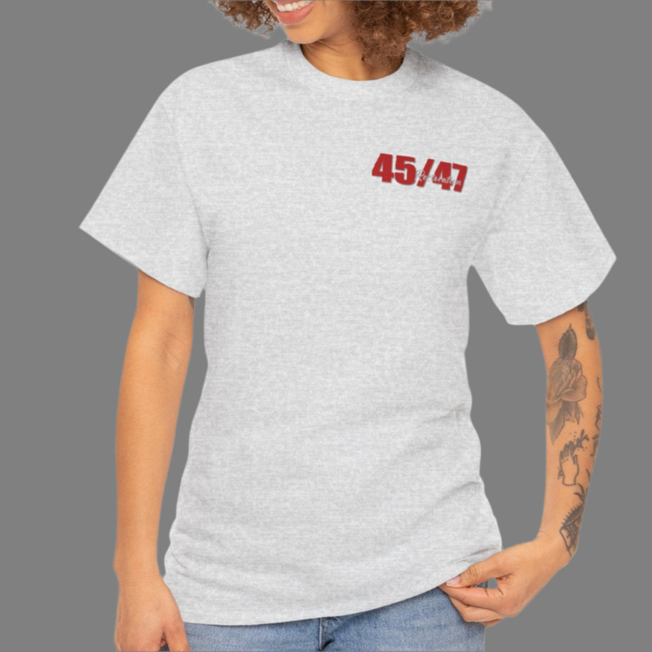 Cotton t-shirt imprinted in red with a gray overprint on the back of the names and strongest qualities of President Trump and his cabinet members / nominees. The front is imprinted on the left chest with 45/47 and the word Restoration overprinted in gray.