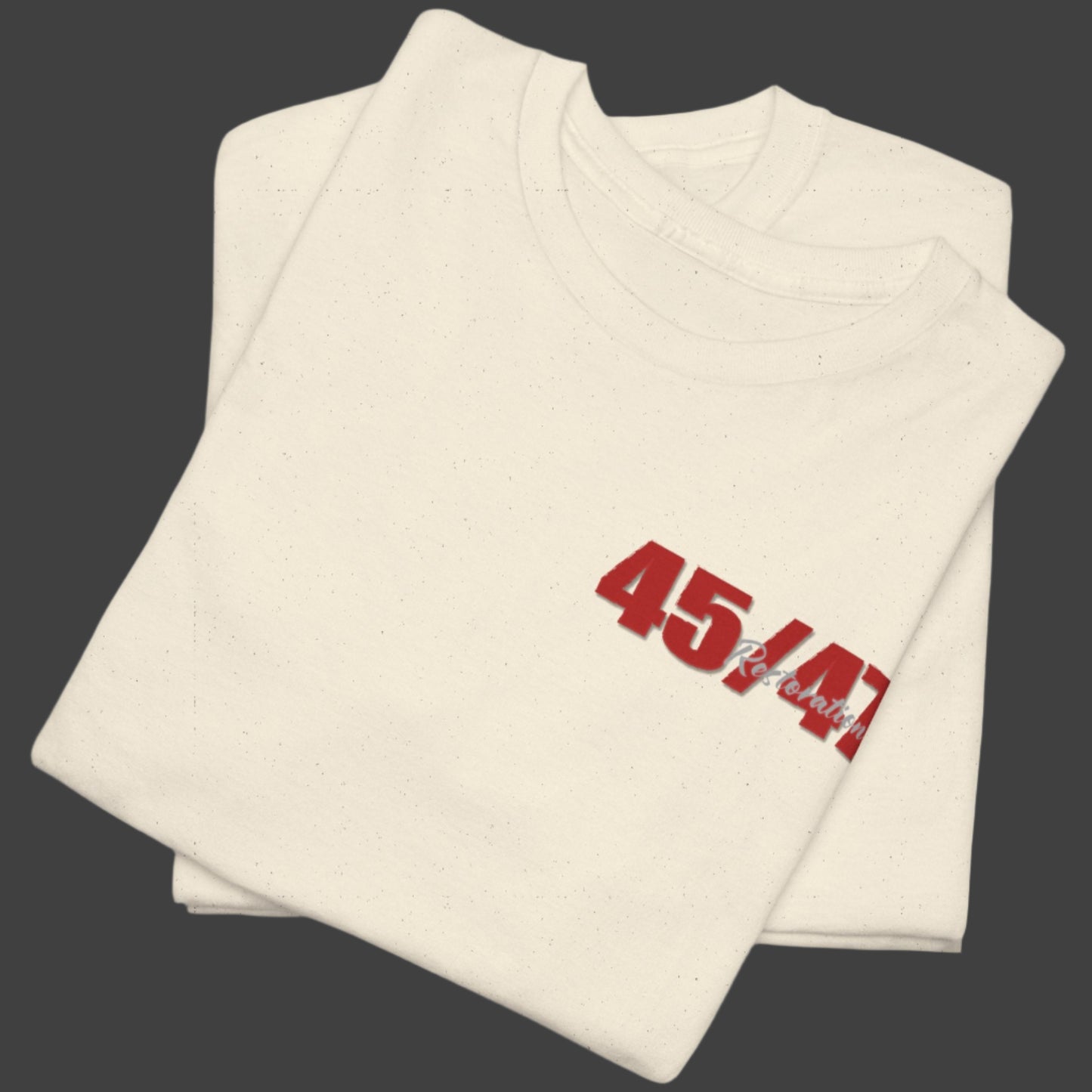 Cotton t-shirt imprinted in red with a gray overprint on the back of the names and strongest qualities of President Trump and his cabinet members / nominees. The front is imprinted on the left chest with 45/47 and the word Restoration overprinted in gray.