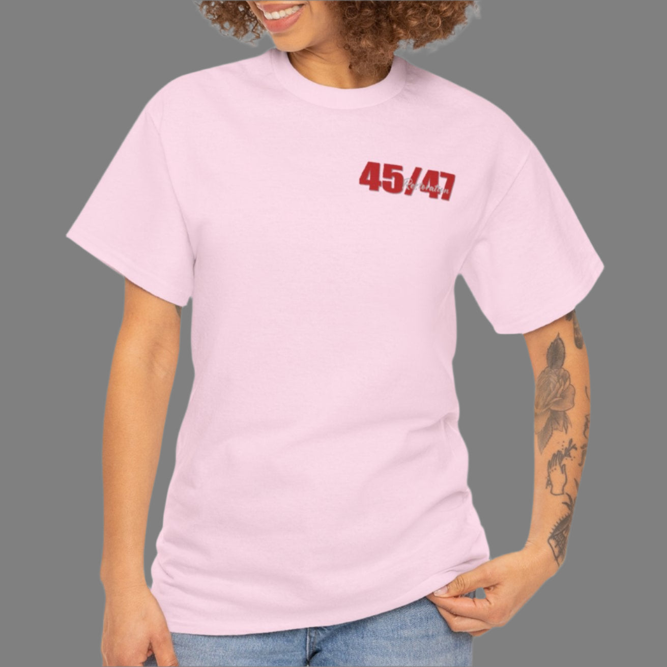 Cotton t-shirt imprinted in red with a gray overprint on the back of the names and strongest qualities of President Trump and his cabinet members / nominees. The front is imprinted on the left chest with 45/47 and the word Restoration overprinted in gray.