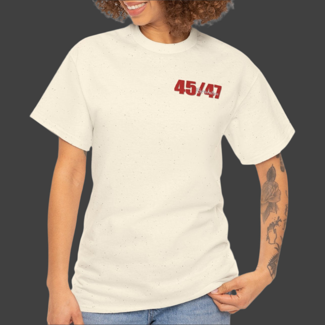 Cotton t-shirt imprinted in red with a gray overprint on the back of the names and strongest qualities of President Trump and his cabinet members / nominees. The front is imprinted on the left chest with 45/47 and the word Restoration overprinted in gray.