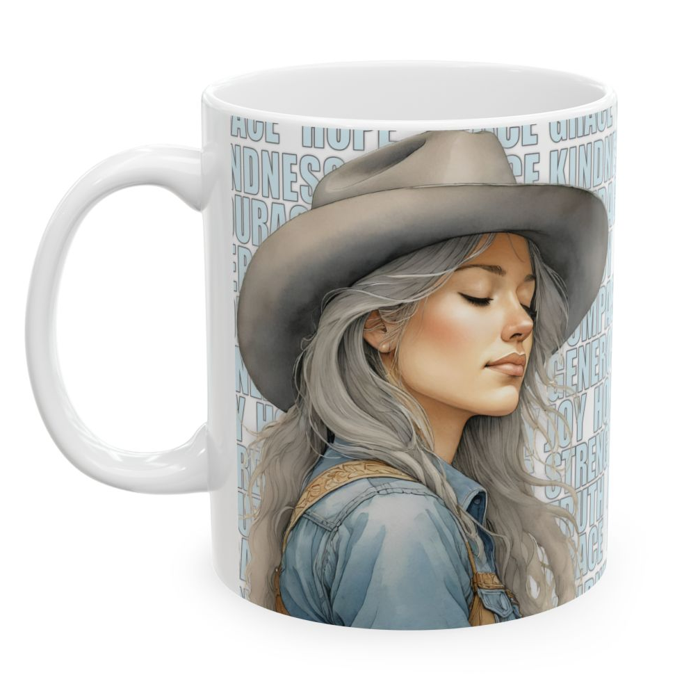 BETH. Our happiest cowgirls grace these 11 oz and 15 oz white ceramic mugs. We've also added a plethora of positive words to help get your day off to the right start. Glossy finish.