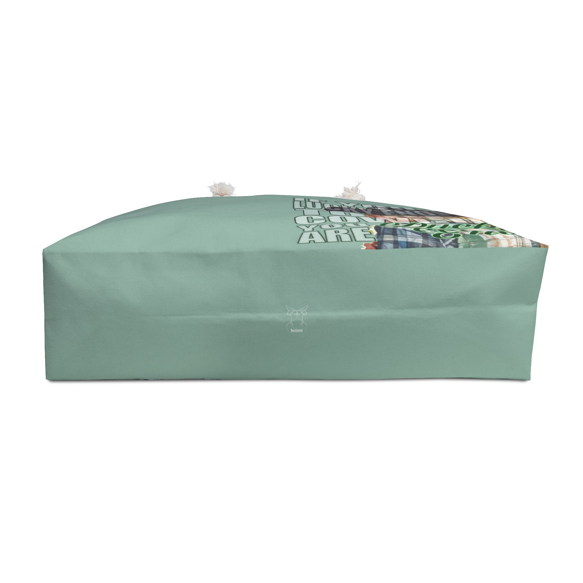 Pretty mint green weekender bag is imprinted both sides with ou exclusive Lucky Enough image of a blond, laughing, and happy cowgirl in a plaid shirt on the right side. Bag features white rope handles and sheeting lining. 