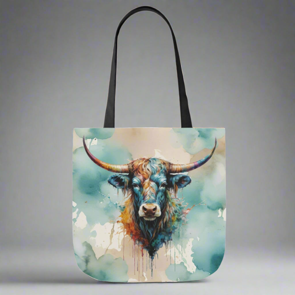 Poly canvas tote with woven coltton handles. Imprinted with pretty watercolor background and colorful steer head on both sides. Available in 3 sizes. 