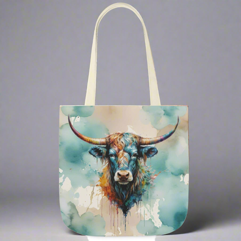 Poly canvas tote with woven coltton handles. Imprinted with pretty watercolor background and colorful steer head on both sides. Available in 3 sizes. 