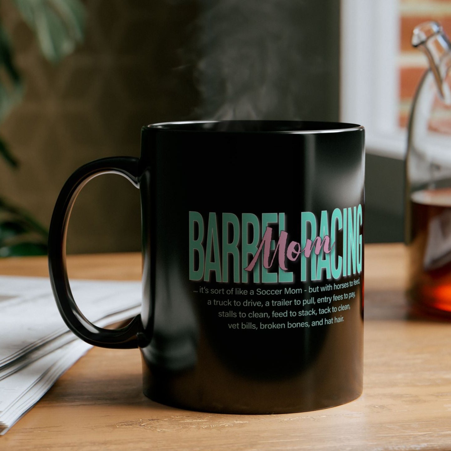 Glossy black 11  oz. coffee mug imprinted with Barrel Racing Mom on both sides is perfect gift for the  rodeo mom you know and love. (Even if she's you! Treat yourself!)