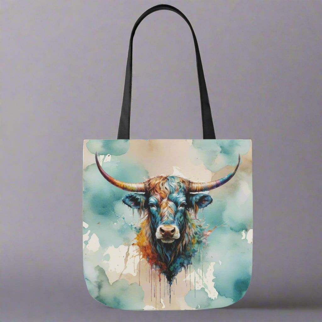 Poly canvas tote with woven cotton handles. Imprinted with pretty watercolor background and colorful steer head on both sides. Available in 3 sizes. 