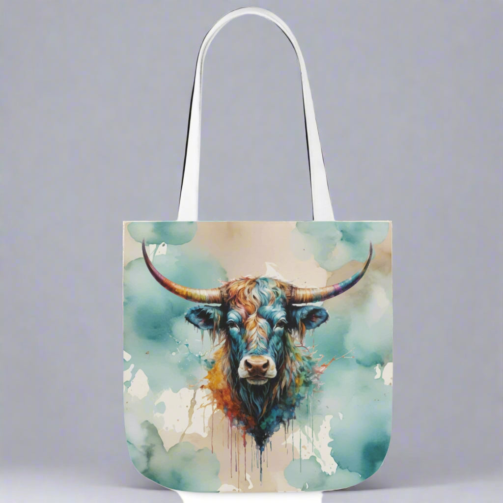 Poly canvas tote with woven cotton handles. Imprinted with pretty watercolor background and colorful steer head on both sides. Available in 3 sizes. 